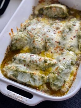 baked pesto chicken in baking dish