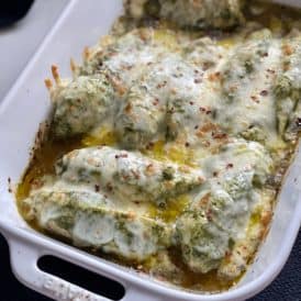 baked pesto chicken in baking dish