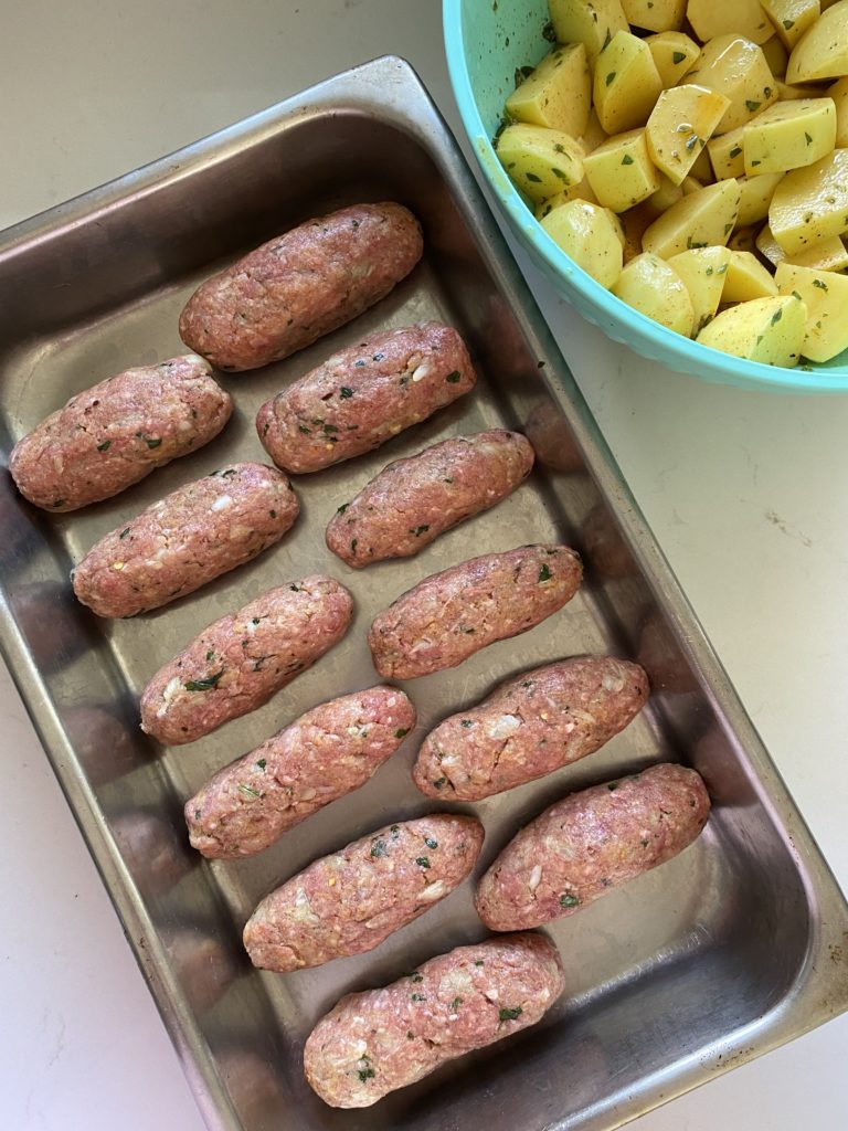 Soutzoukakia - Greek baked sausaged-shaped meatballs