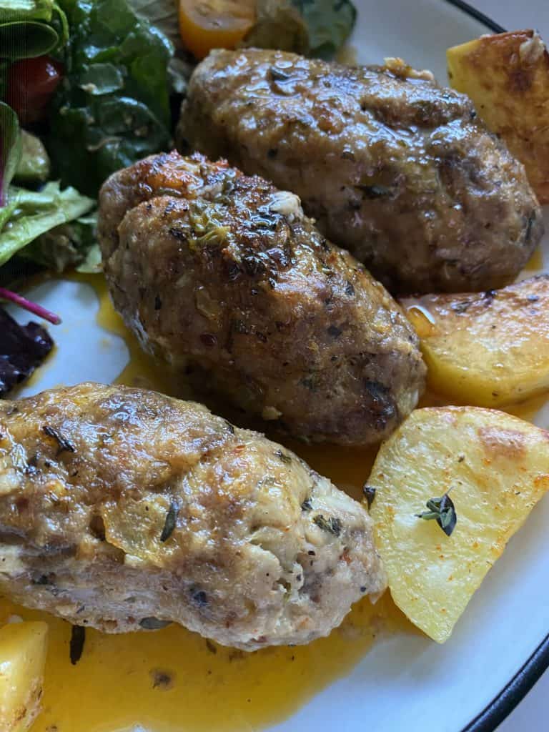 Soutzoukakia - Greek baked sausaged-shaped meatballs