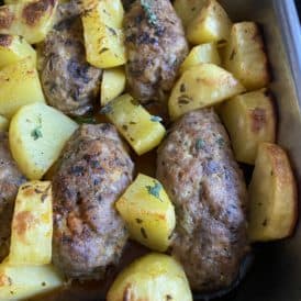 baked pan view of the soutzoukakia