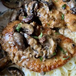 chicken marsala plated with pasta