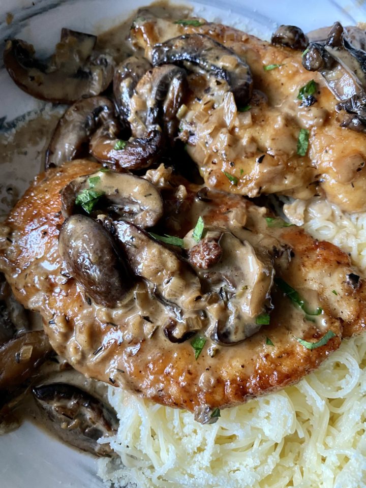 chicken marsala plated with pasta