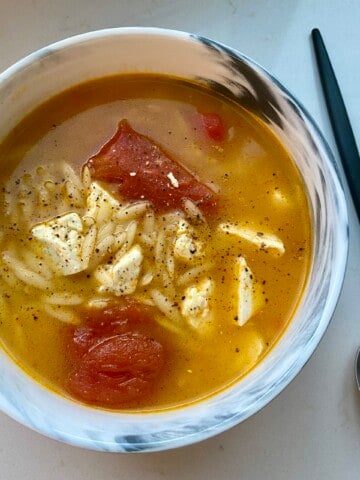 tomato feta soup in a bowl