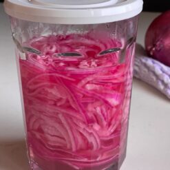 pickled red onions in the jar