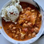 lasagna soup with ricotta scoop