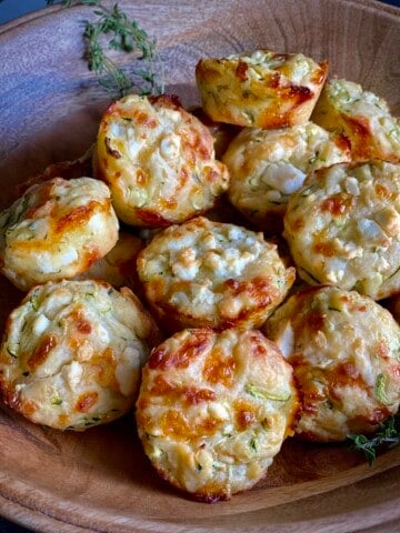 feta zucchini muffins in a basket
