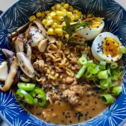 spicy pork ramen bowls close up