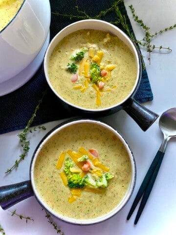 chicken broccoli cheddar soup in two bowls