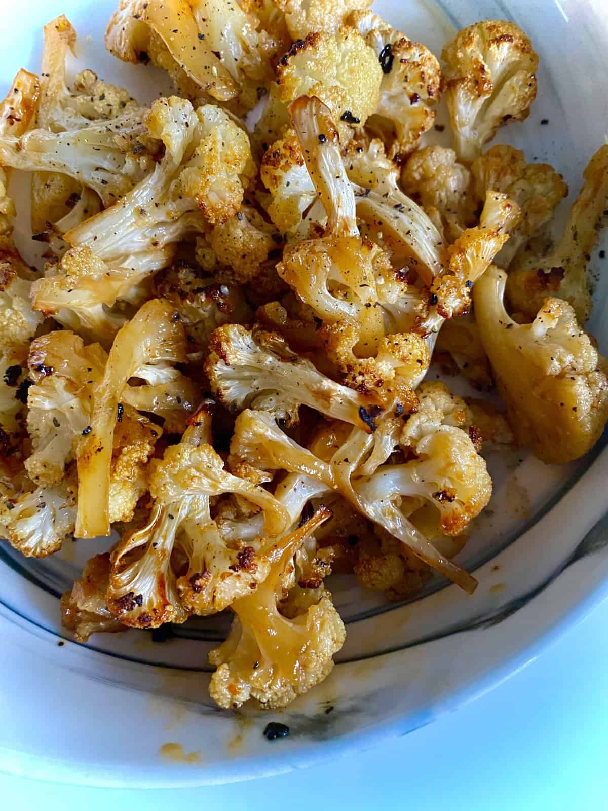 Sweet And Spicy Roasted Cauliflower - Hungry Happens