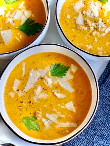 pumpkin sausage soup in bowls