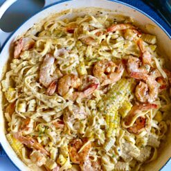 creamy shrimp pasta and corn in the pan
