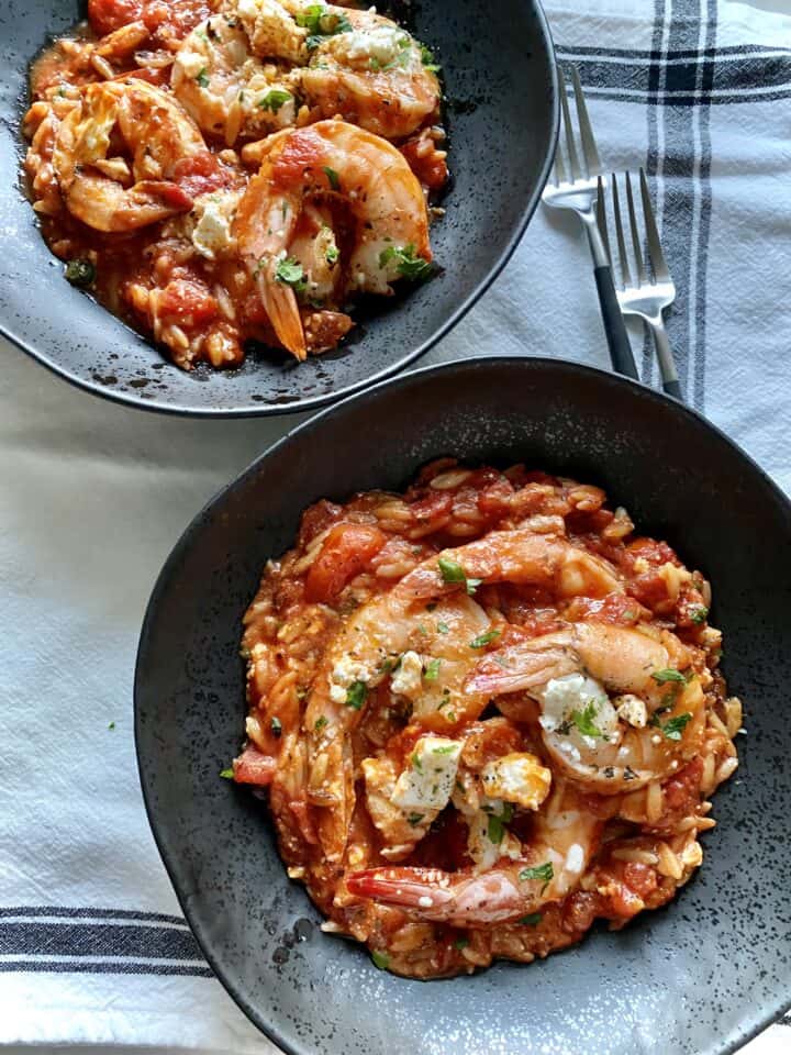 shrimp saganaki orzo plated in bowls