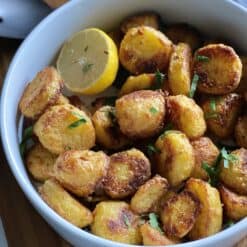 crispy lemon potatoes in a bowl