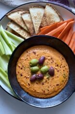 spicy feta dip with carrots celery and pita chips