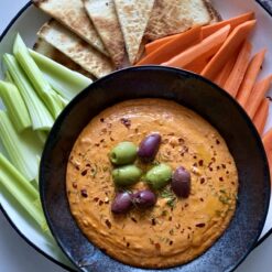 spicy feta dip with carrots celery and pita chips