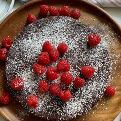 flourless chocolate cake with powdered sugar
