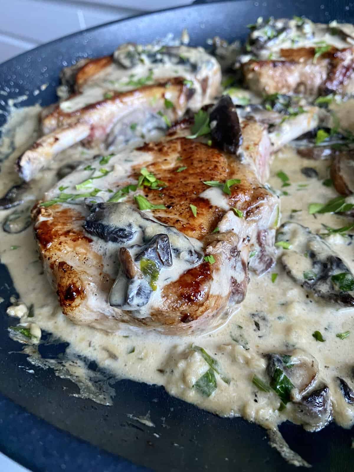 One Pan Creamy Garlic Mushroom Pork Chops Hungry Happens