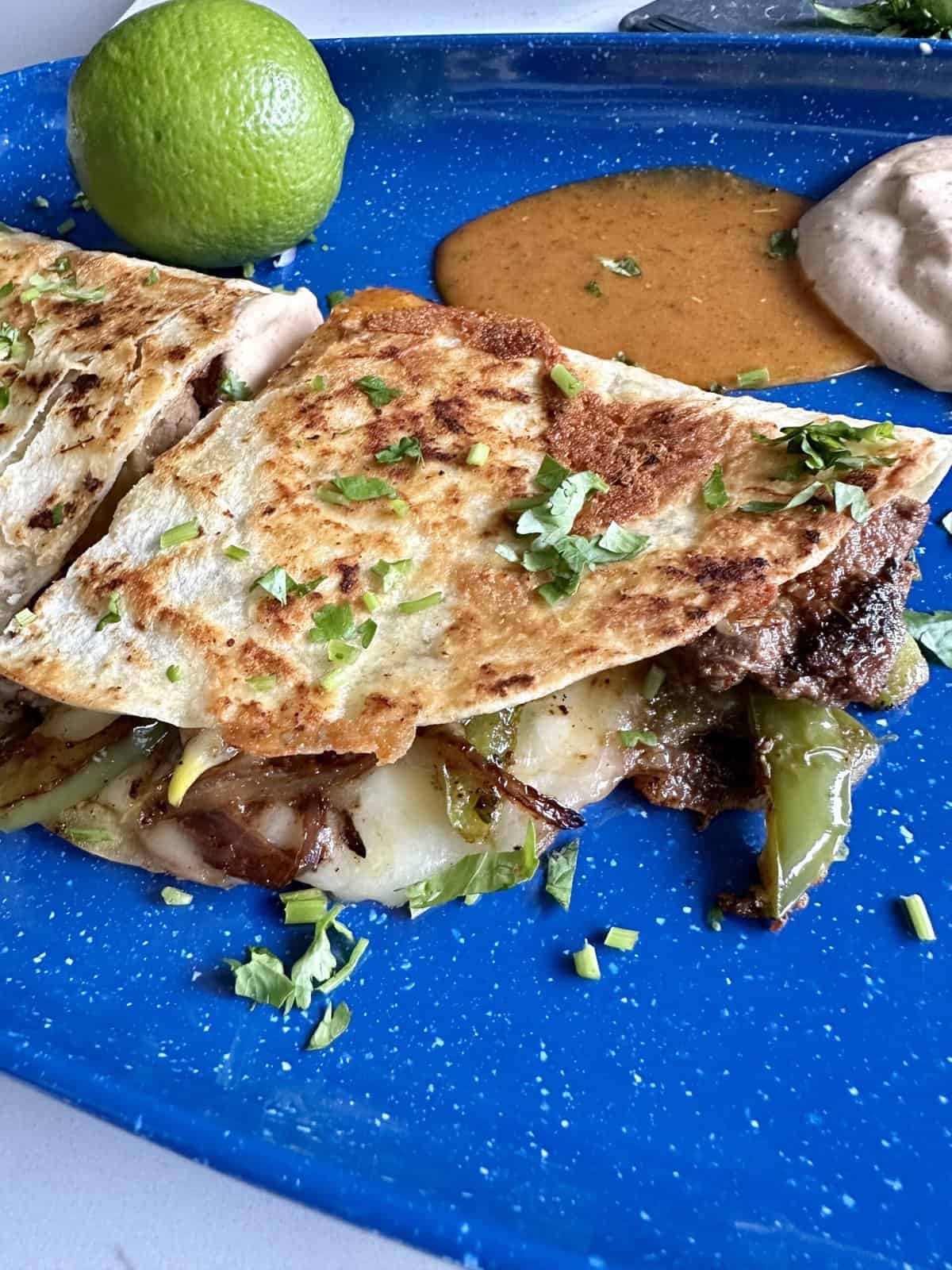 Chipotle Philly Cheesesteak Quesadilla with Honey Chipotle Vinaigrette