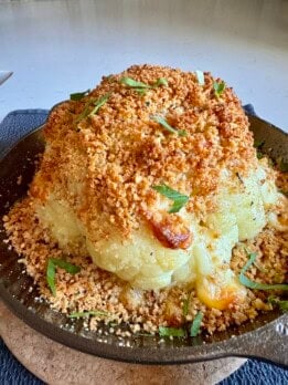 cheesy stuffed cauliflower head