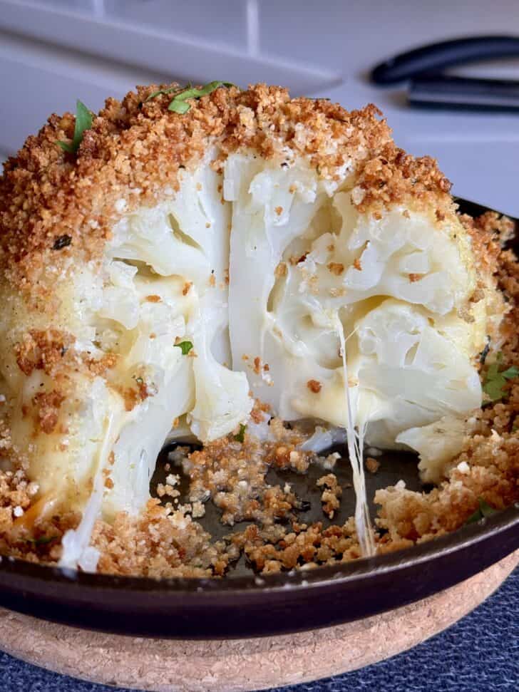 cheesy stuffed cauliflower head