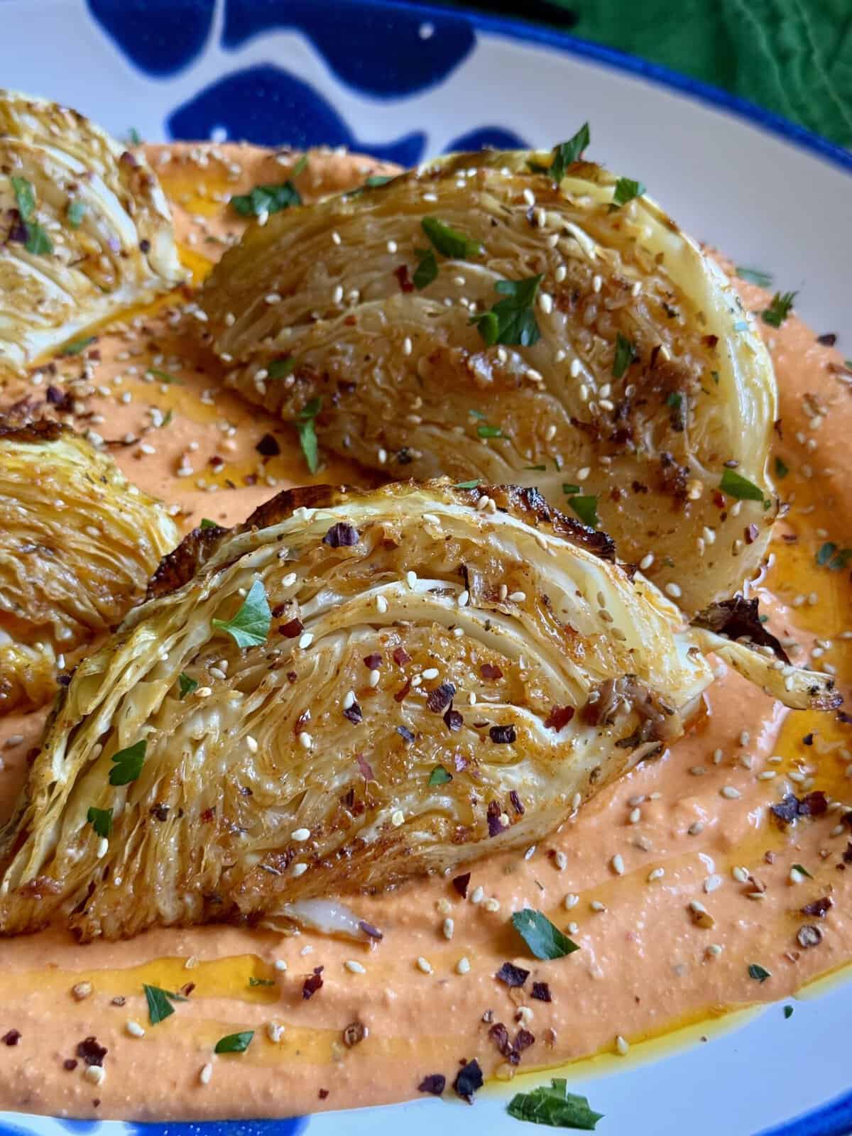 roasted cabbage wedges over tirokafteri