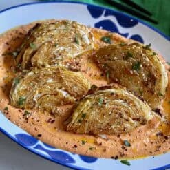 roasted cabbage wedges over tirokafteri