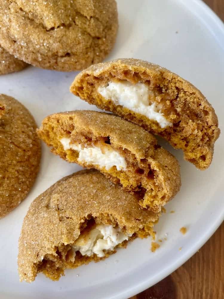 Pumpkin Cheesecake Snickerdoodles, split in half and stacked