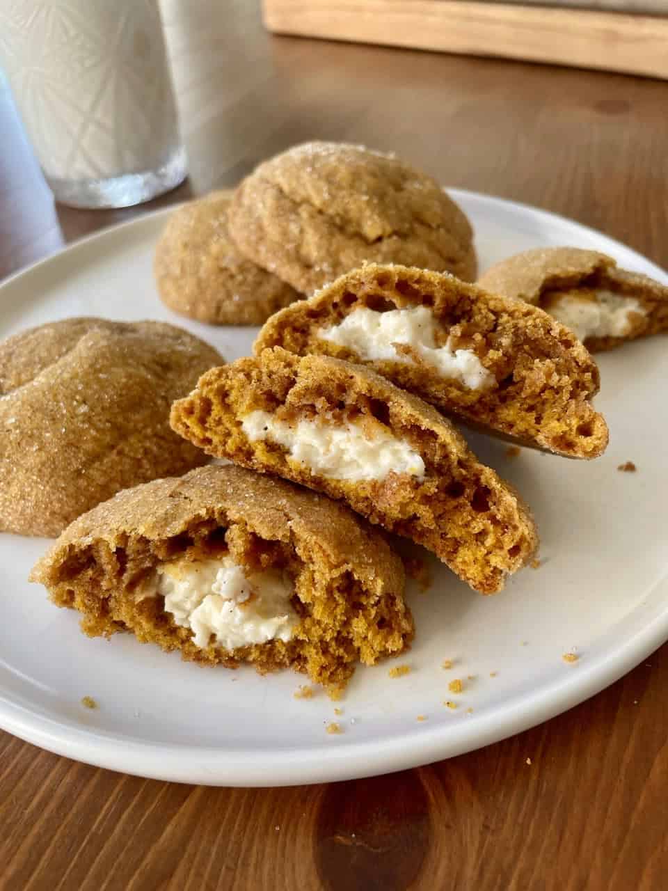 Pumpkin Cheesecake Snickerdoodles, split in half and stacked